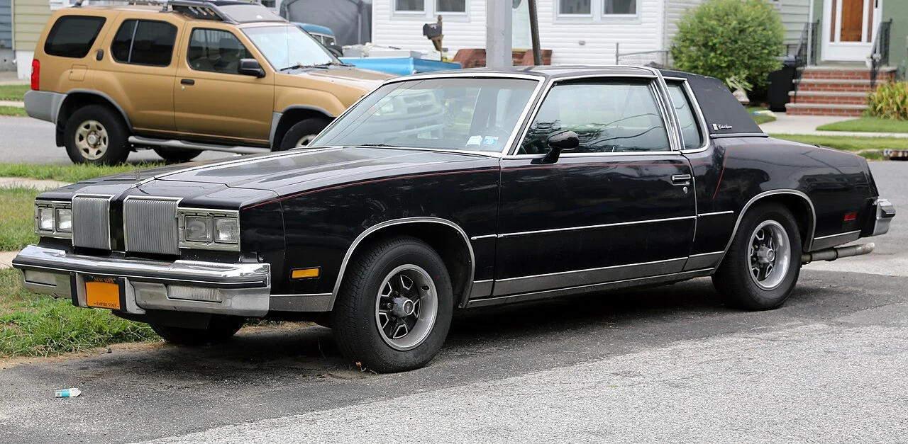 Black 1980 Oldsmobile Cutlass Supreme two-door coupe