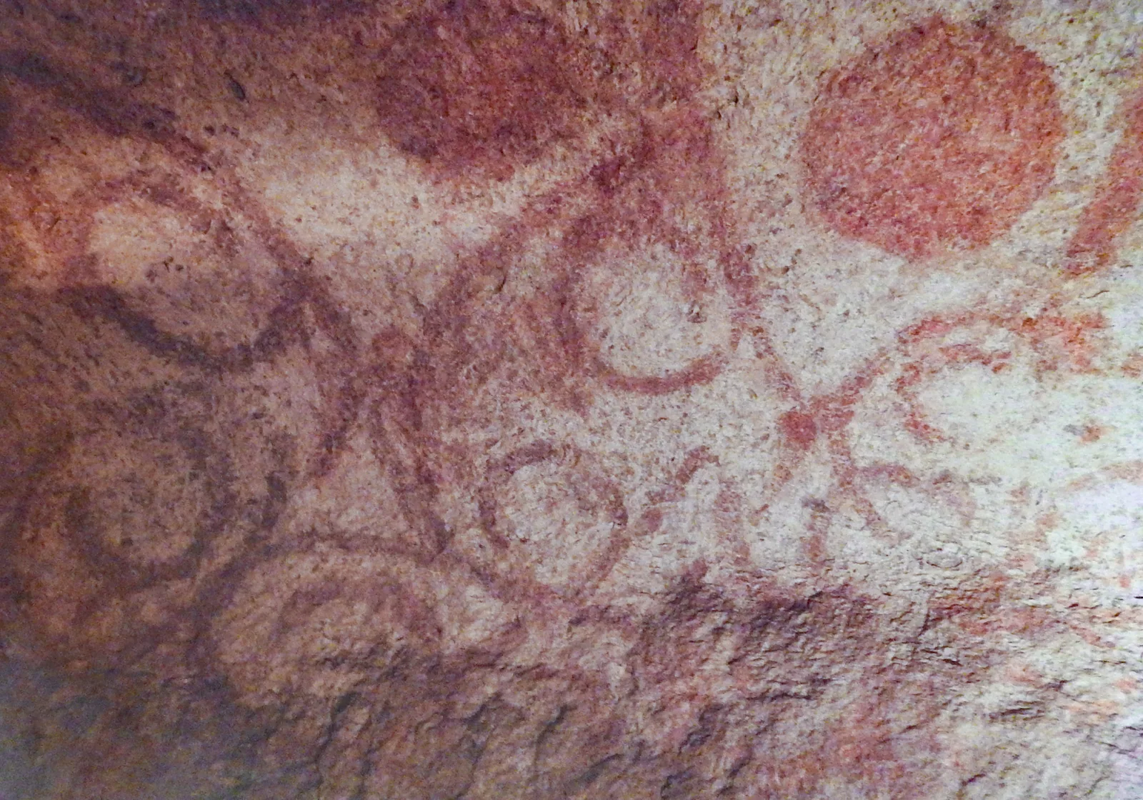 Red ochre spiral and disk paintings on the ceiling of the Oracle Chamber, Ħal Saflieni Hypogeum